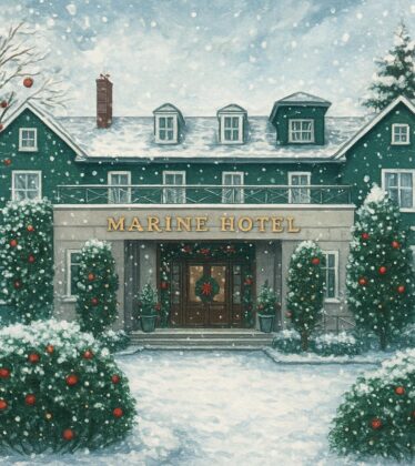 Snow-covered Marine Hotel entrance with festive decorations, inviting guests to cosy holiday stay.
